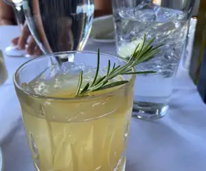 La Medicina cocktail: scotch, honey, ginger, lemon, Solerno blood orange liquor, Laphroaig float, rosemary